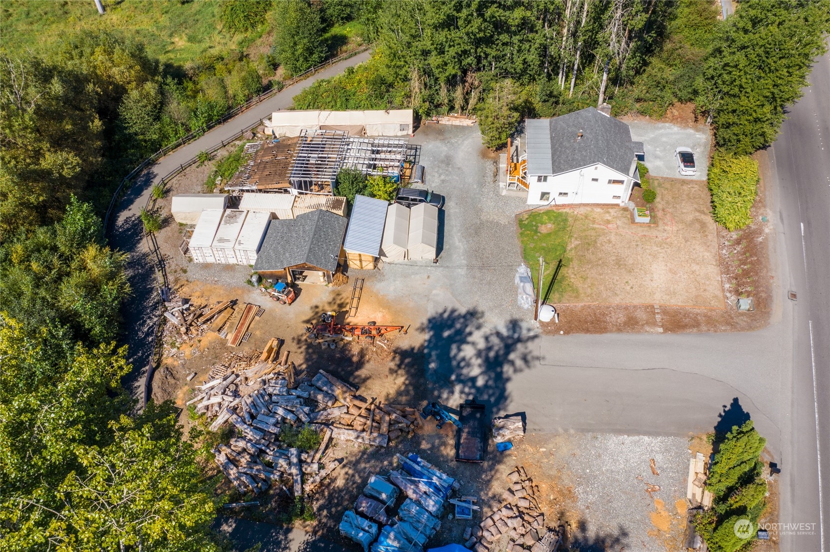 21204 Bothell Everett Highway Bothell, WA 98021 - Photo 3 of 6 an aerial view of residential house with outdoor space