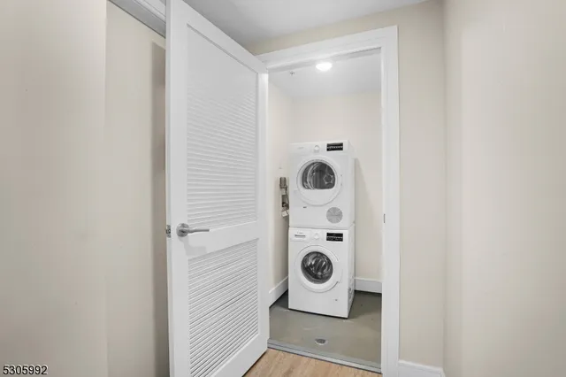 a bathroom with a toilet and a window