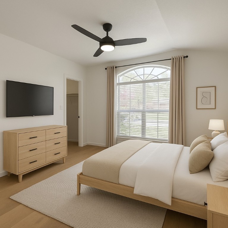 4821 Chesney Ridge Drive Austin, TX 78749 - Photo 11 of 15 a bedroom with a bed and a flat screen tv