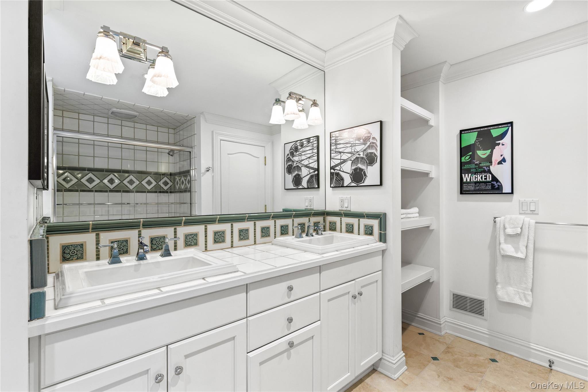 63 Old Mill River Road Pound Ridge, NY 10576 - Photo 23 of 47 a bathroom with a double vanity sink and a mirror