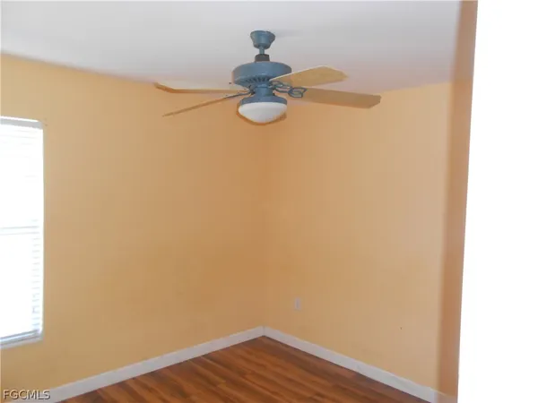 a view of small space with wooden floor