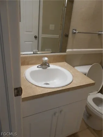 a bathroom with a sink and a toilet