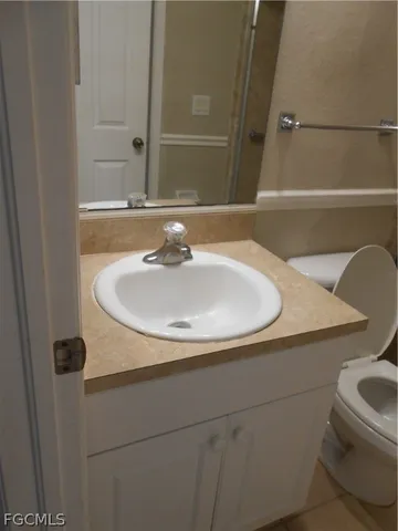 a bathroom with a sink and a toilet