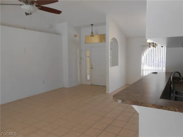 a view of a livingroom with a staircase