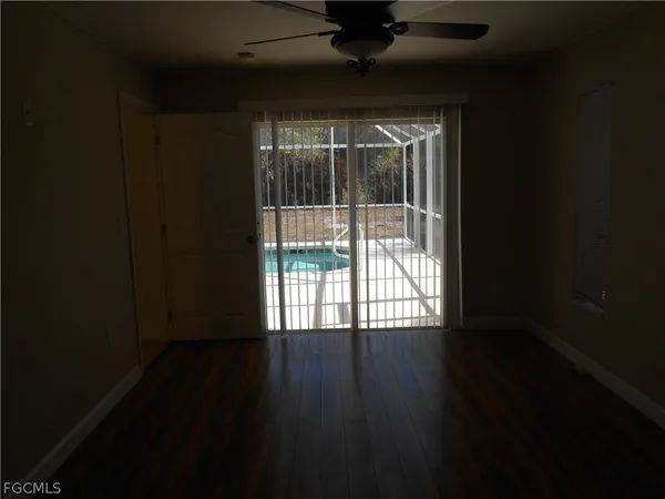 a view of backyard with trampoline
