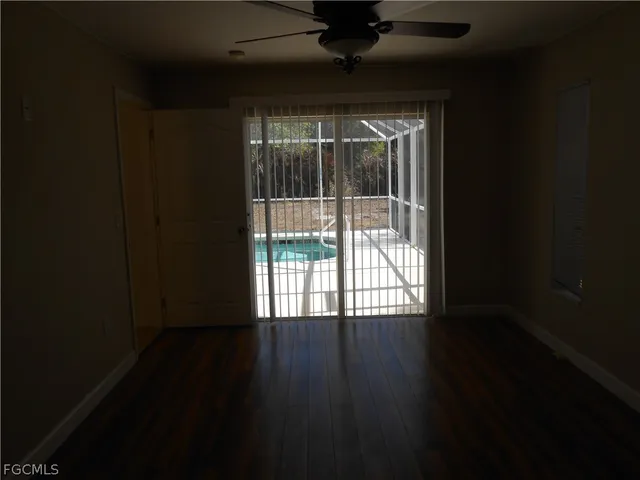 a view of backyard with trampoline