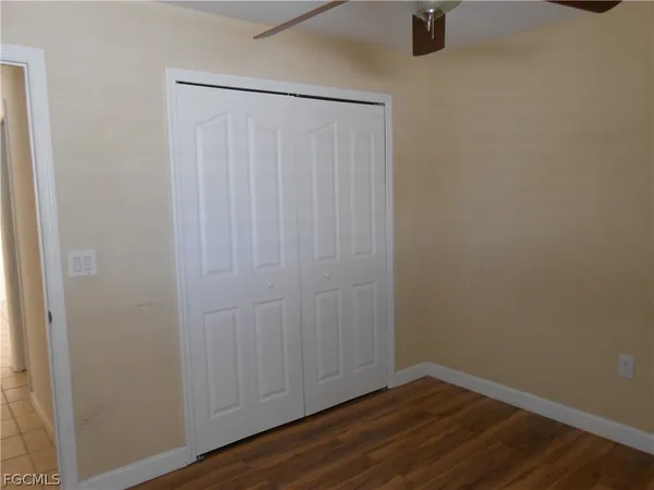 a view of a small space with wooden floor