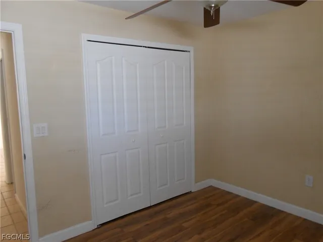 a view of a small space with wooden floor