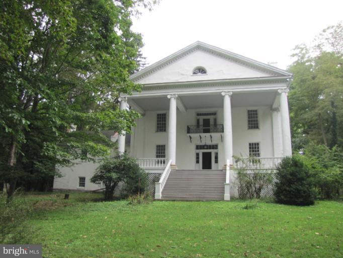 142 Falling Spring Road Shepherdstown, WV 25443 - Photo 1 of 27 a front view of a house with a yard
