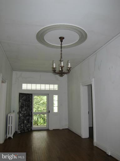 142 Falling Spring Road Shepherdstown, WV 25443 - Photo 17 of 27 a view of a room with wooden floor chandelier and entryway