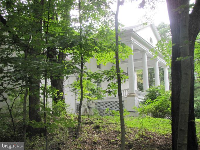 142 Falling Spring Road Shepherdstown, WV 25443 - Photo 5 of 27 a view of a garden in the backyard