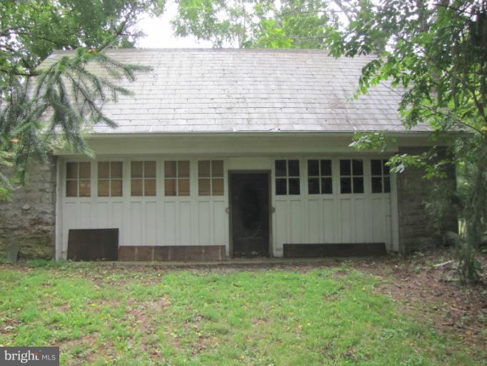142 Falling Spring Road Shepherdstown, WV 25443 - Photo 6 of 27 a house view with a garden space