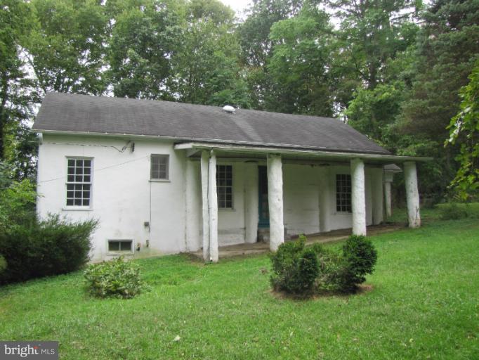 142 Falling Spring Road Shepherdstown, WV 25443 - Photo 9 of 27 a view of a house with a yard