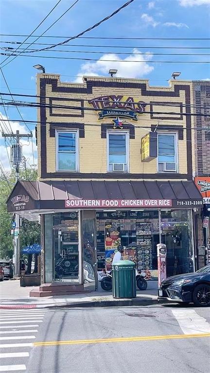 113-18 Sutphin Boulevard Queens, NY 11435 - Photo 3 of 3 a view of a building with a window and a fireplace
