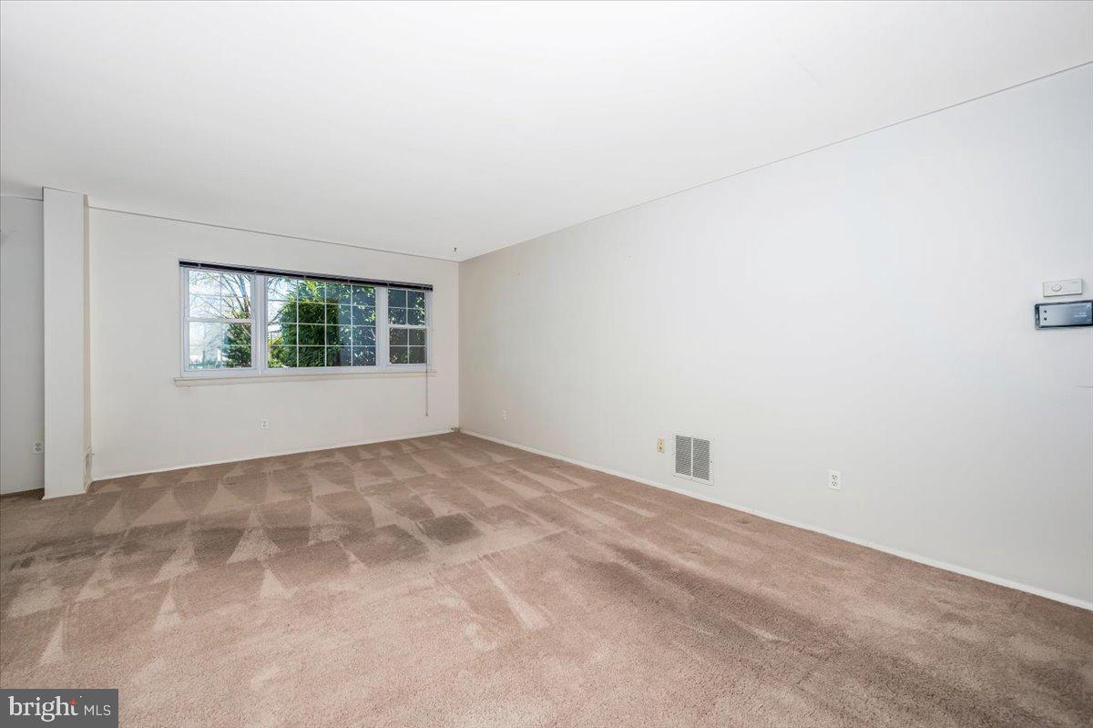 17305 Hoskinson Road Poolesville, MD 20837 - Photo 16 of 81 a view of an empty room with a window