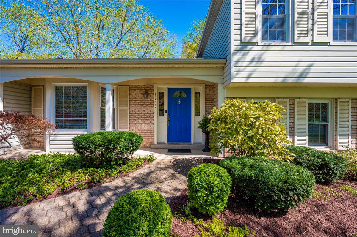 17305 Hoskinson Road Poolesville, MD 20837 - Photo 2 of 81 front view of a house with a yard