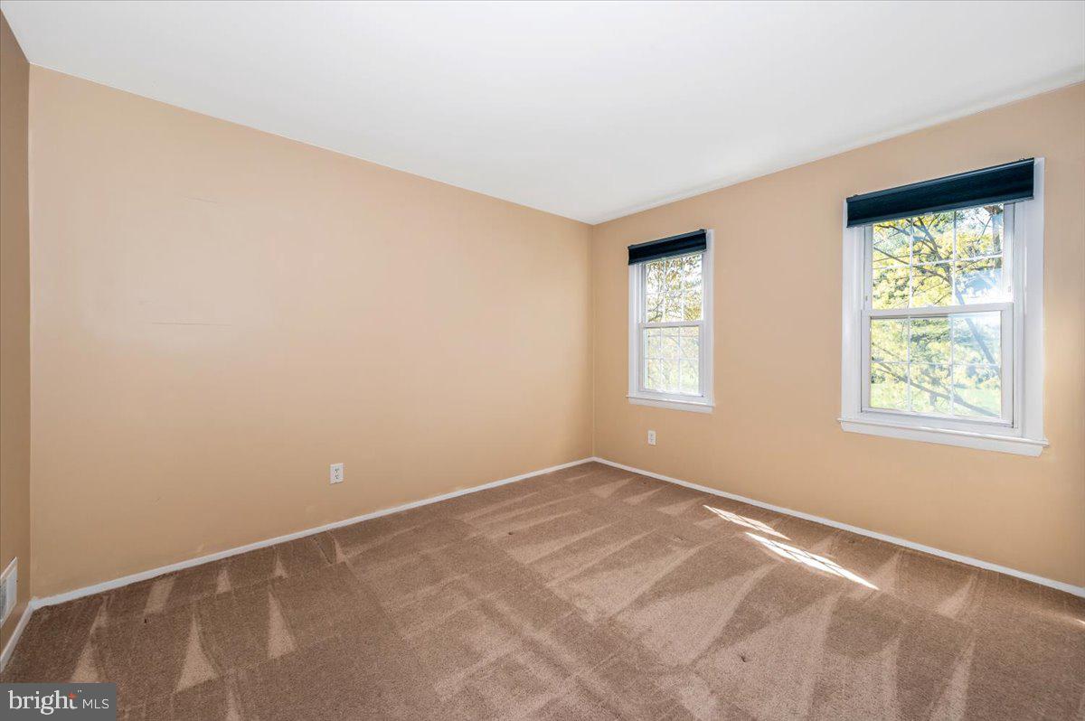 17305 Hoskinson Road Poolesville, MD 20837 - Photo 23 of 81 a view of an empty room with a window