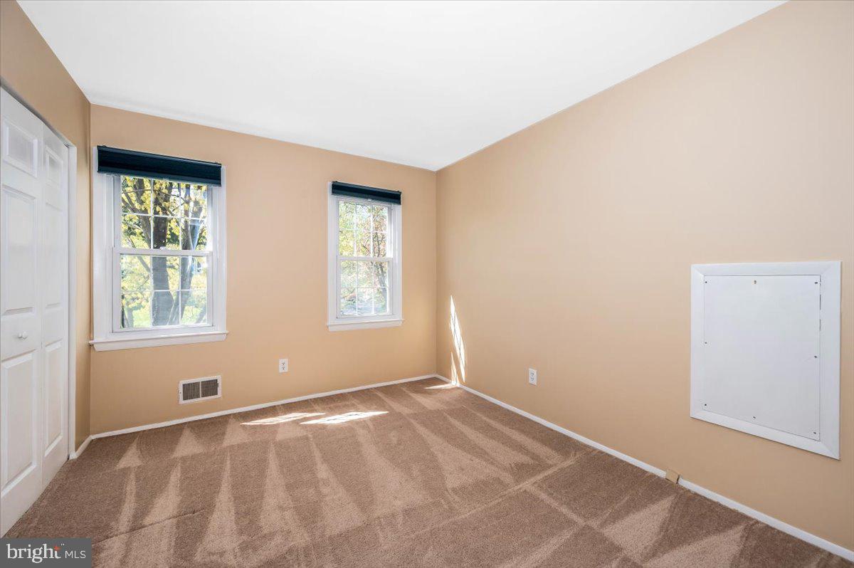 17305 Hoskinson Road Poolesville, MD 20837 - Photo 24 of 81 an empty room with windows