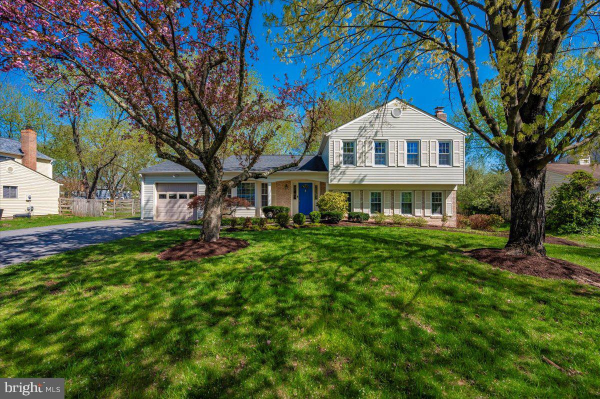 17305 Hoskinson Road Poolesville, MD 20837 - Photo 46 of 81 a front view of a house with a yard
