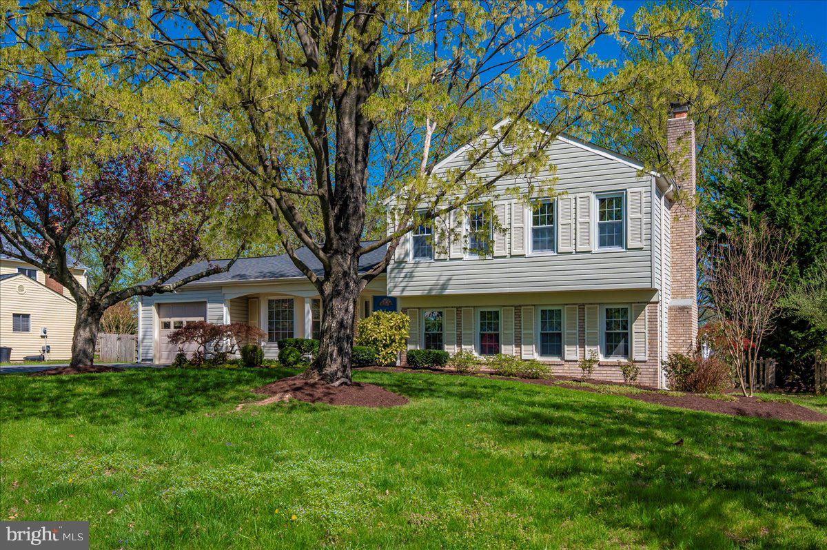17305 Hoskinson Road Poolesville, MD 20837 - Photo 51 of 81 a front view of a house with a yard