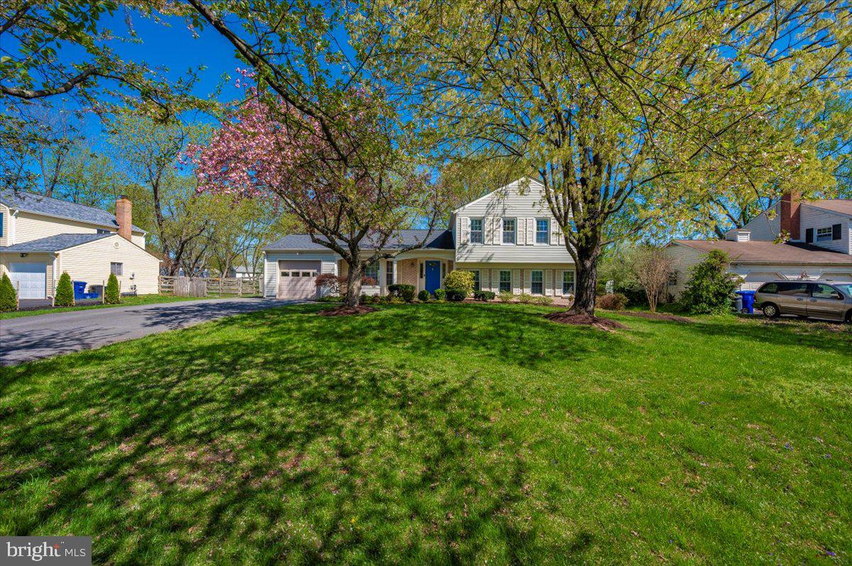 17305 Hoskinson Road Poolesville, MD 20837 - Photo 52 of 81 a front view of a house with a yard
