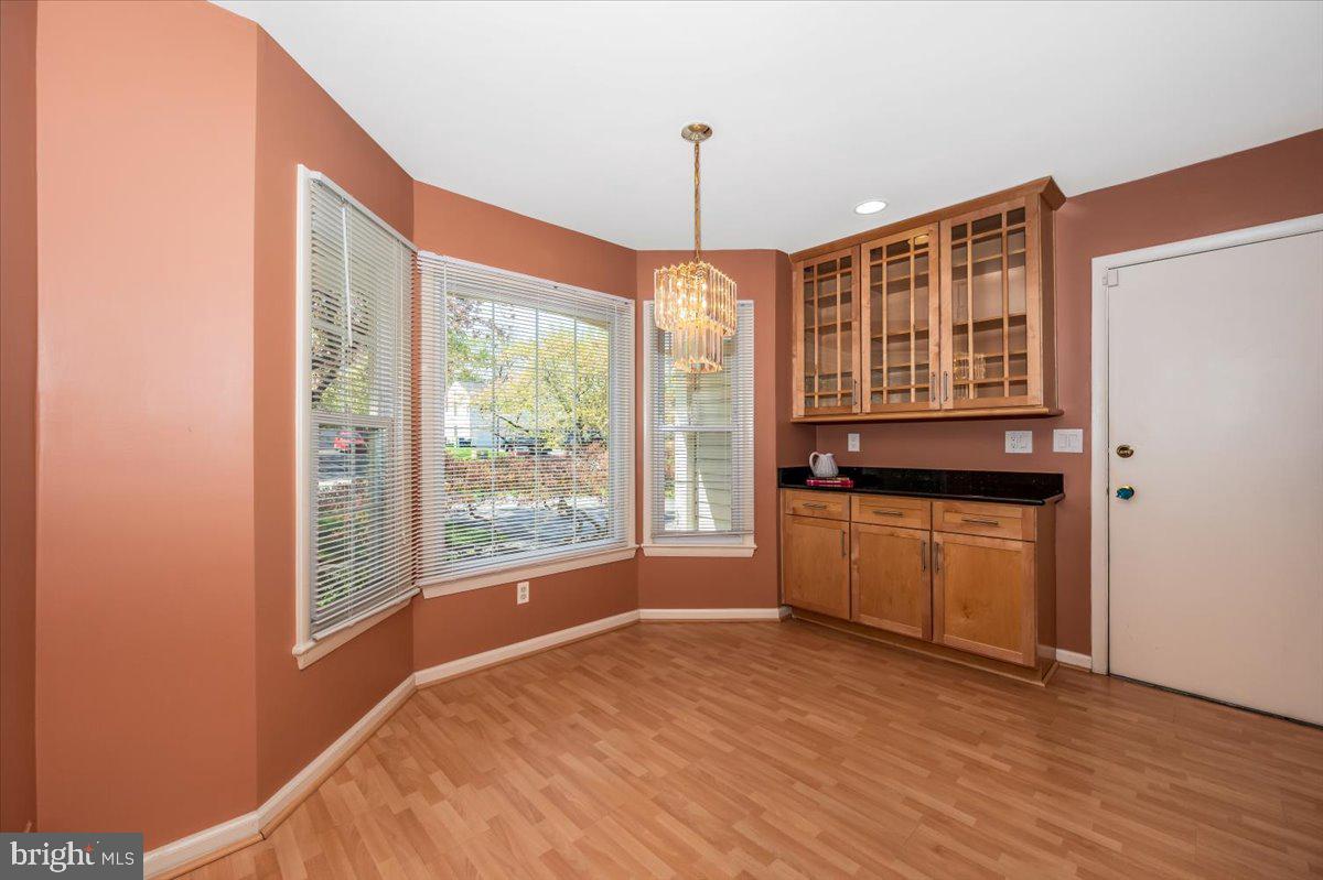 17305 Hoskinson Road Poolesville, MD 20837 - Photo 6 of 81 a kitchen with stainless steel appliances granite countertop a stove a sink and a refrigerator