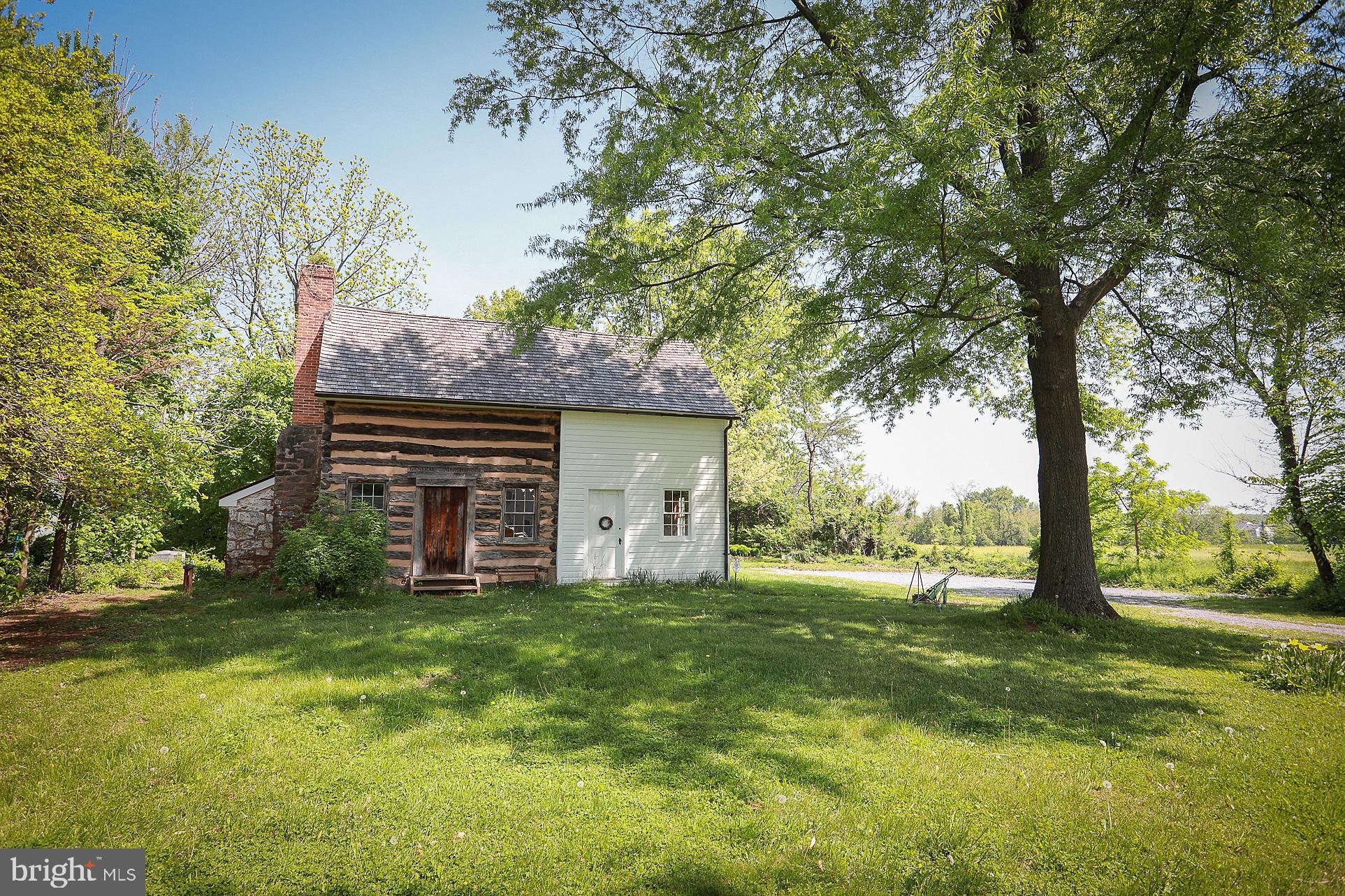17305 Hoskinson Road Poolesville, MD 20837 - Photo 72 of 81 a view of a house with a yard