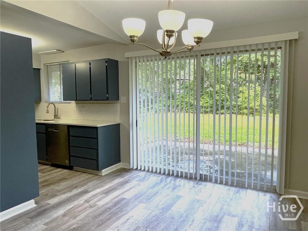 12509 Woodley Road Savannah, GA 31419 - Photo 4 of 14 Dining area with sliding doors to patio
