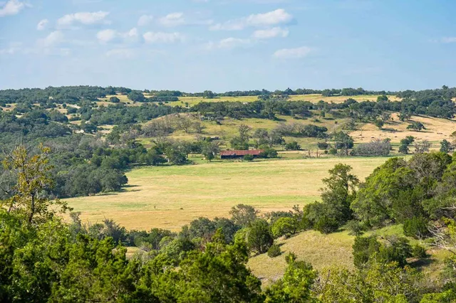 a view of an ocean and city