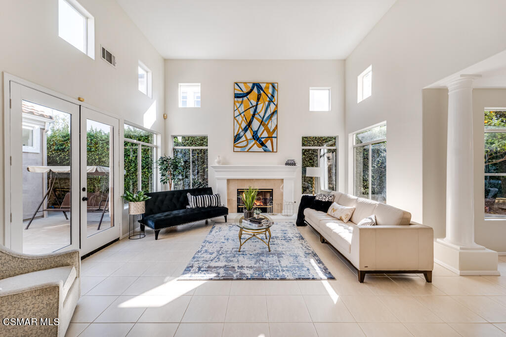 11292 Broadview Drive Moorpark, CA 93021 - Photo 12 of 58 a living room with furniture large window and glass door