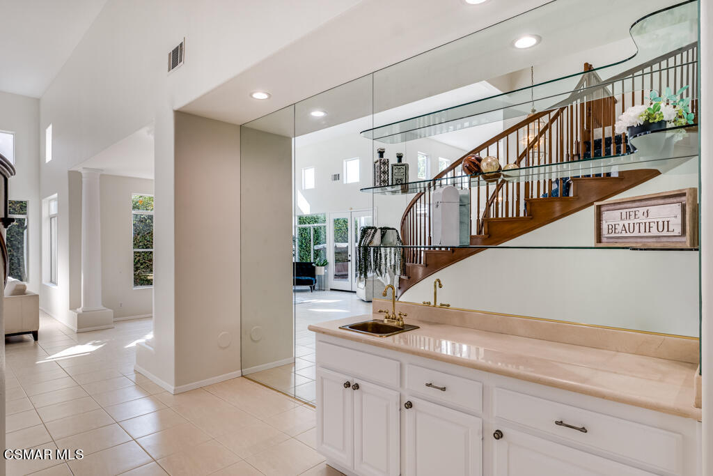 11292 Broadview Drive Moorpark, CA 93021 - Photo 18 of 58 a view of staircase with lots of frames and frames on wall