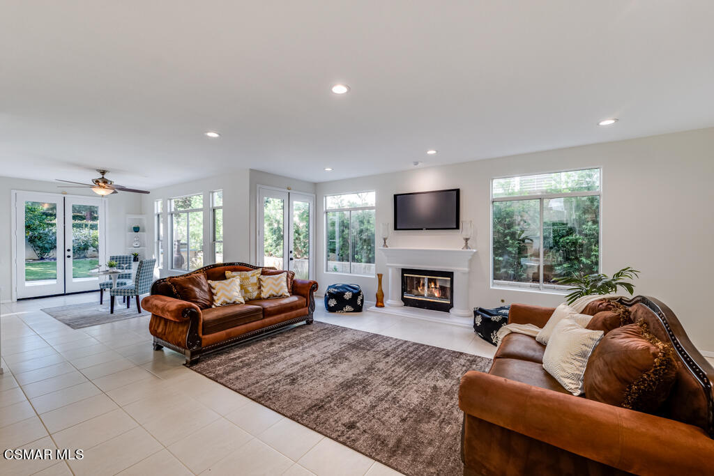 11292 Broadview Drive Moorpark, CA 93021 - Photo 20 of 58 a living room with furniture window and a fireplace