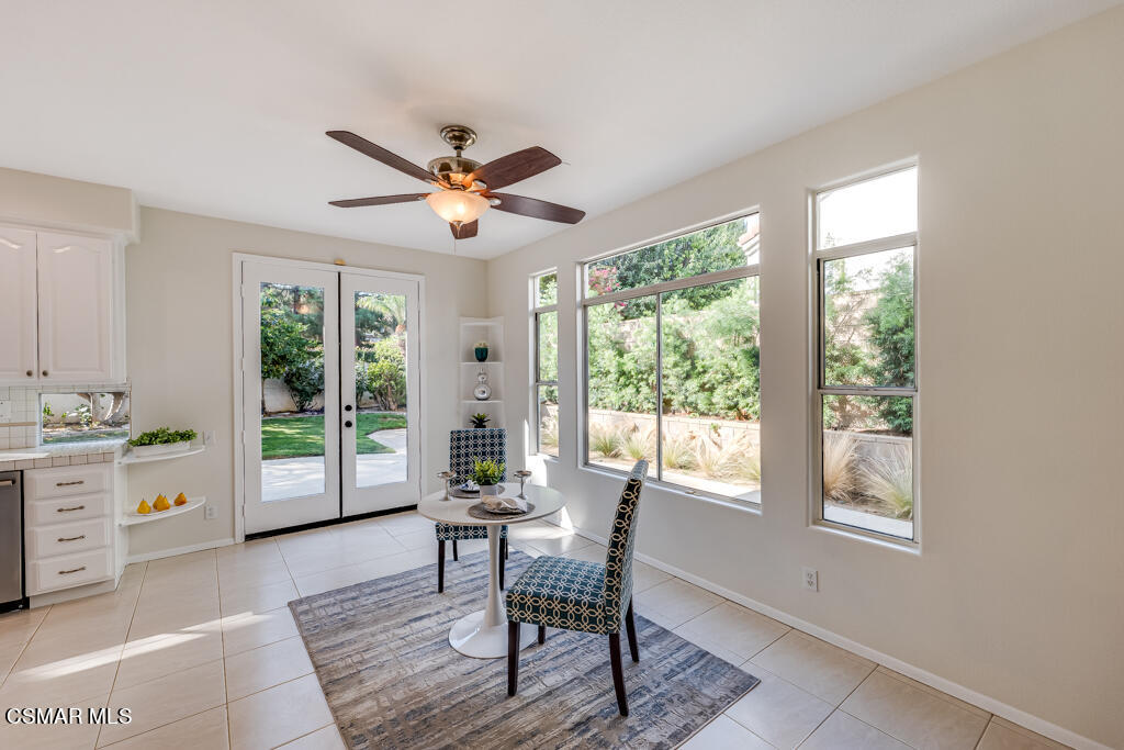 11292 Broadview Drive Moorpark, CA 93021 - Photo 22 of 58 a dining room with furniture a chandelier and wooden floor