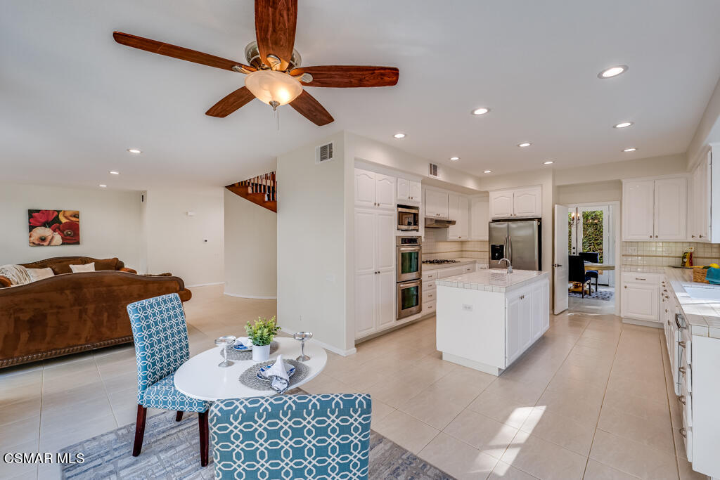 11292 Broadview Drive Moorpark, CA 93021 - Photo 24 of 58 a living room with furniture and kitchen view