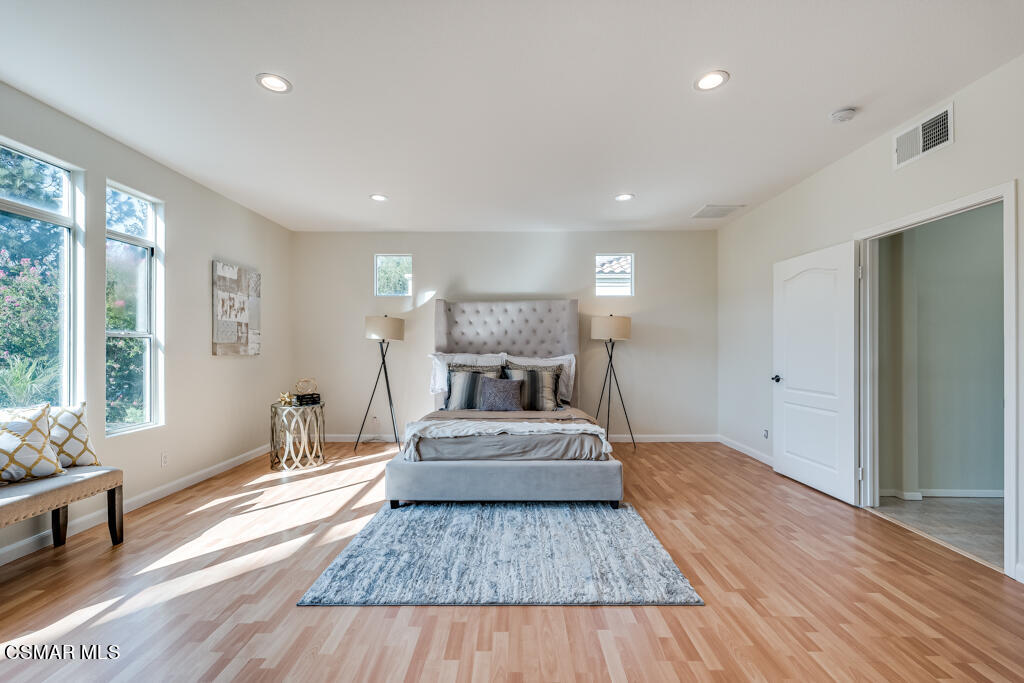 11292 Broadview Drive Moorpark, CA 93021 - Photo 40 of 58 a living room with furniture and wooden floor
