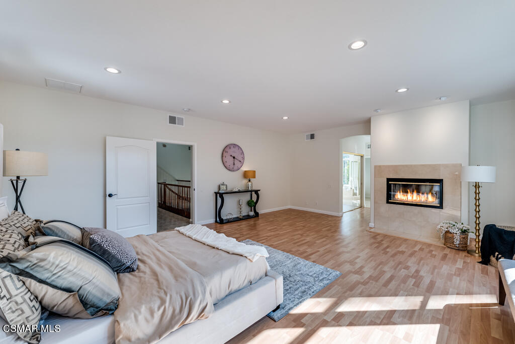 11292 Broadview Drive Moorpark, CA 93021 - Photo 42 of 58 a bed room with a bed and a view of kitchen