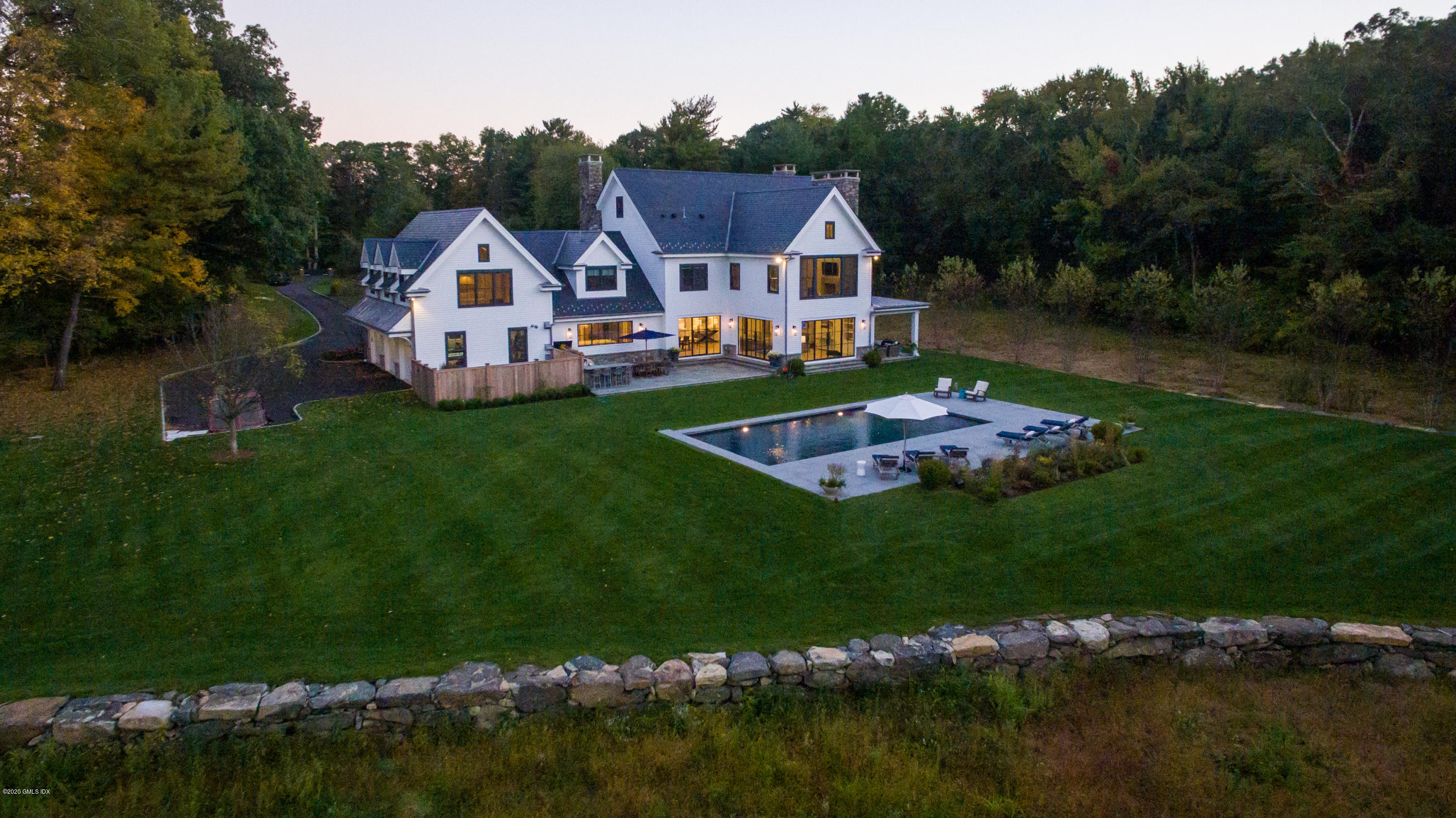 201 Clapboard Ridge Road Greenwich, CT 06831 - Photo 28 of 28 a view of house with garden and lake view