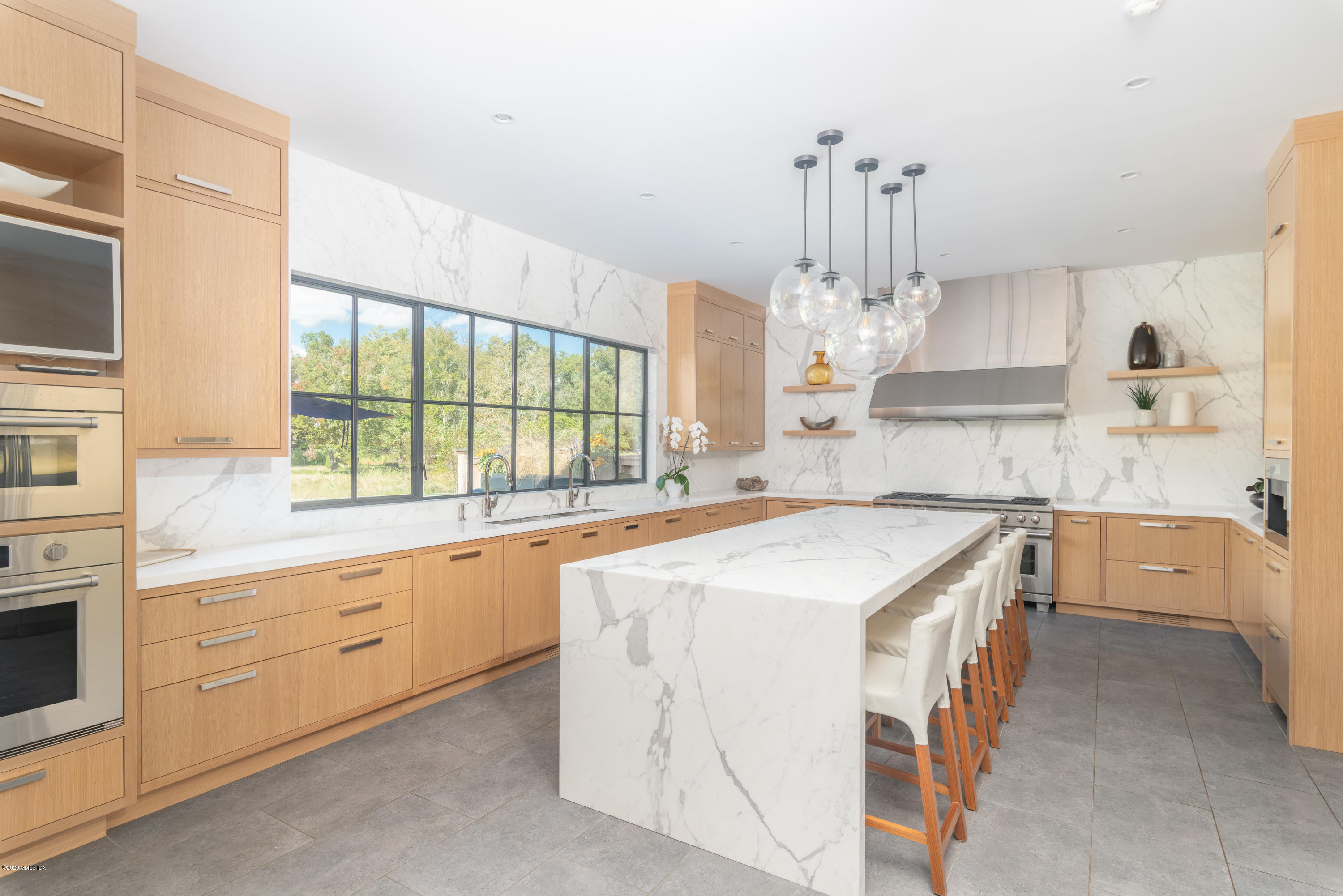 201 Clapboard Ridge Road Greenwich, CT 06831 - Photo 3 of 28 a kitchen that has a lot of counter space
