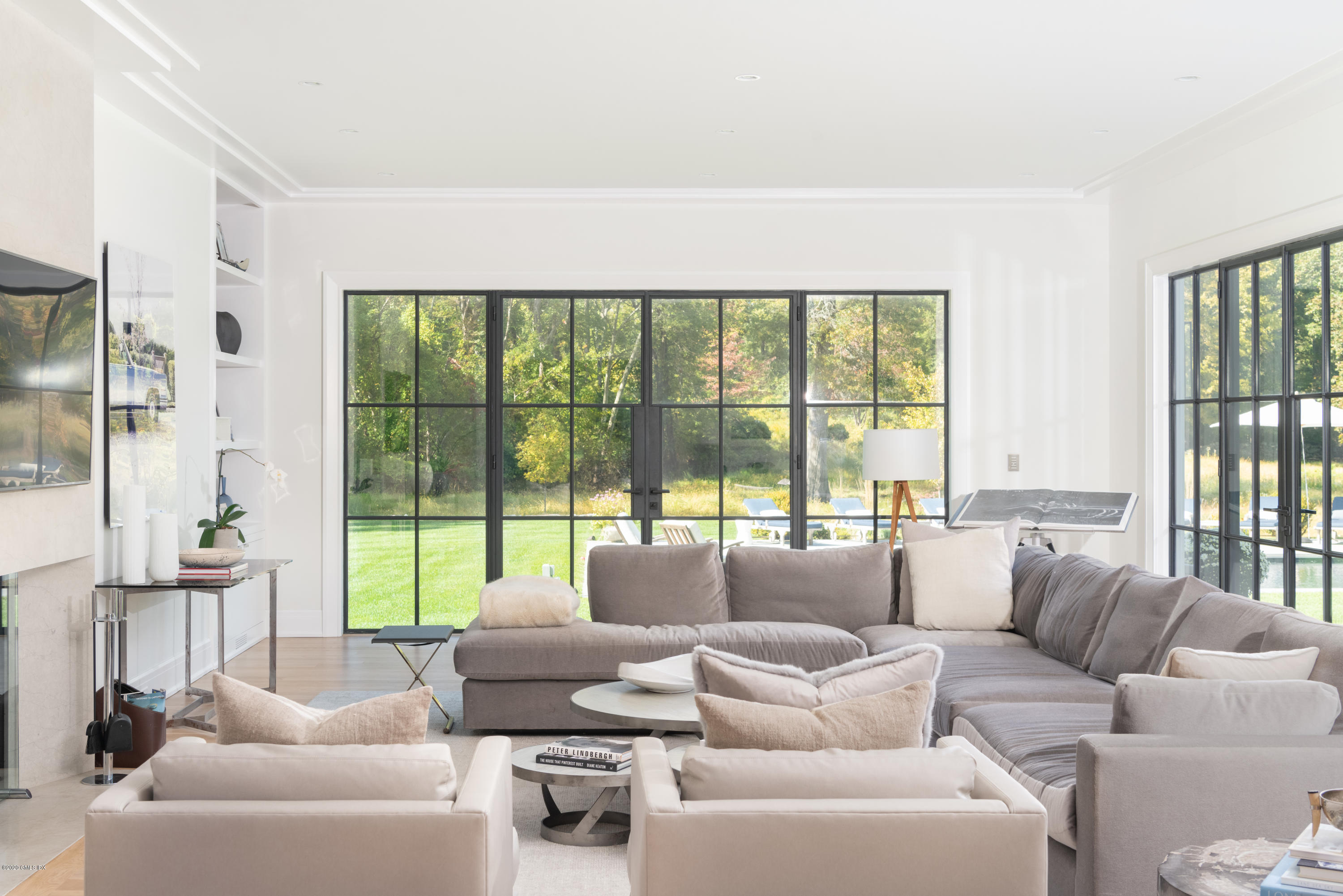 201 Clapboard Ridge Road Greenwich, CT 06831 - Photo 8 of 28 a living room with furniture and a large window