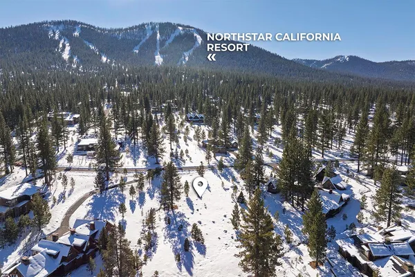 a view of a house with a mountain