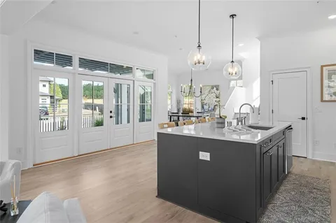 a dining room filled with furniture and window