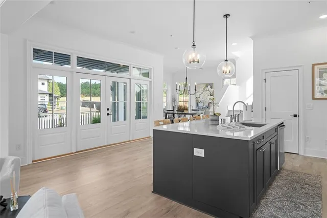 a dining room filled with furniture and window