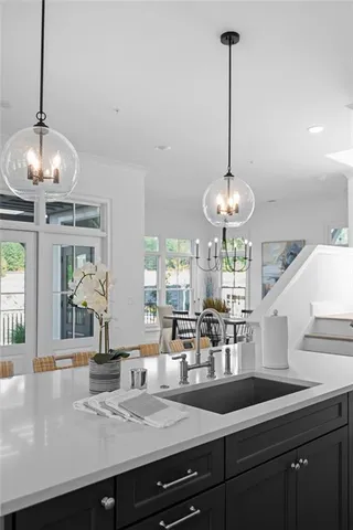 a spacious bedroom with a bed and a window