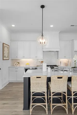 a bathroom with double sink and a mirror
