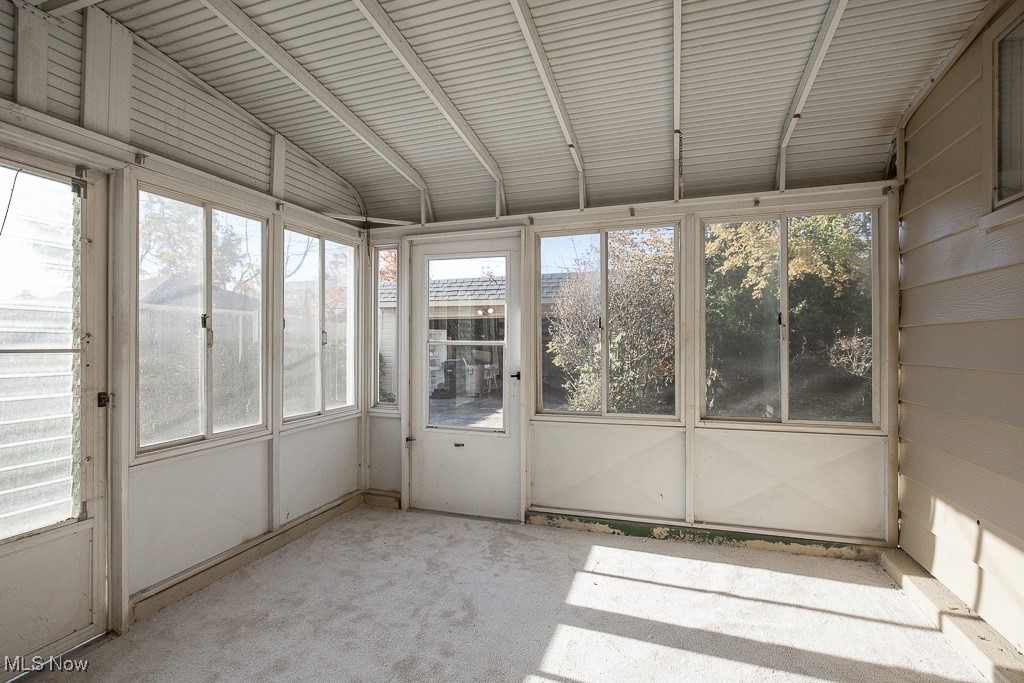 3136 Becket Road Cleveland, OH 44120 - Photo 20 of 39 Unfurnished sunroom with vaulted ceiling and plenty of natural light