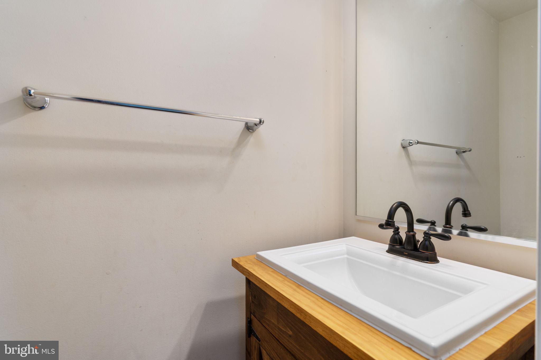202 Cardinal Road Louisa, VA 23093 - Photo 22 of 38 Lower Level half bath