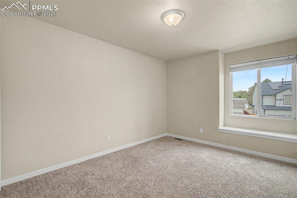 2584 Reed Grass Way Colorado Springs, CO 80915 - Photo 17 of 30 Upstairs bedroom 2