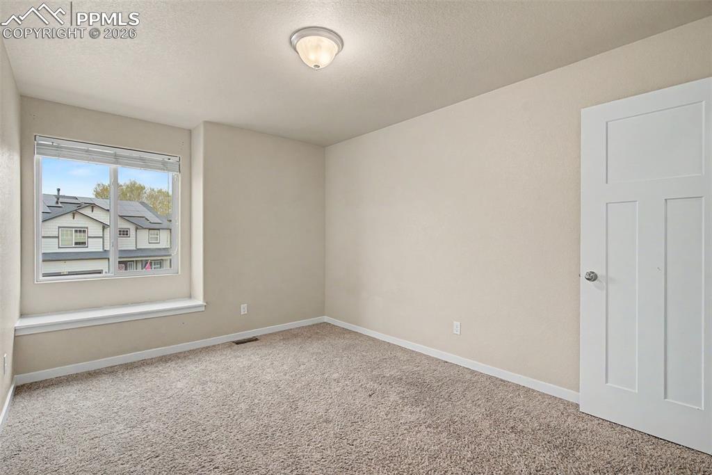 2584 Reed Grass Way Colorado Springs, CO 80915 - Photo 18 of 30 Upstairs bedroom 1