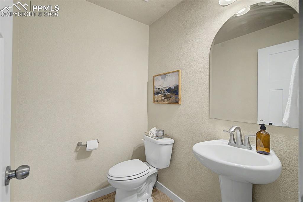 2584 Reed Grass Way Colorado Springs, CO 80915 - Photo 24 of 30 Main level half-bath