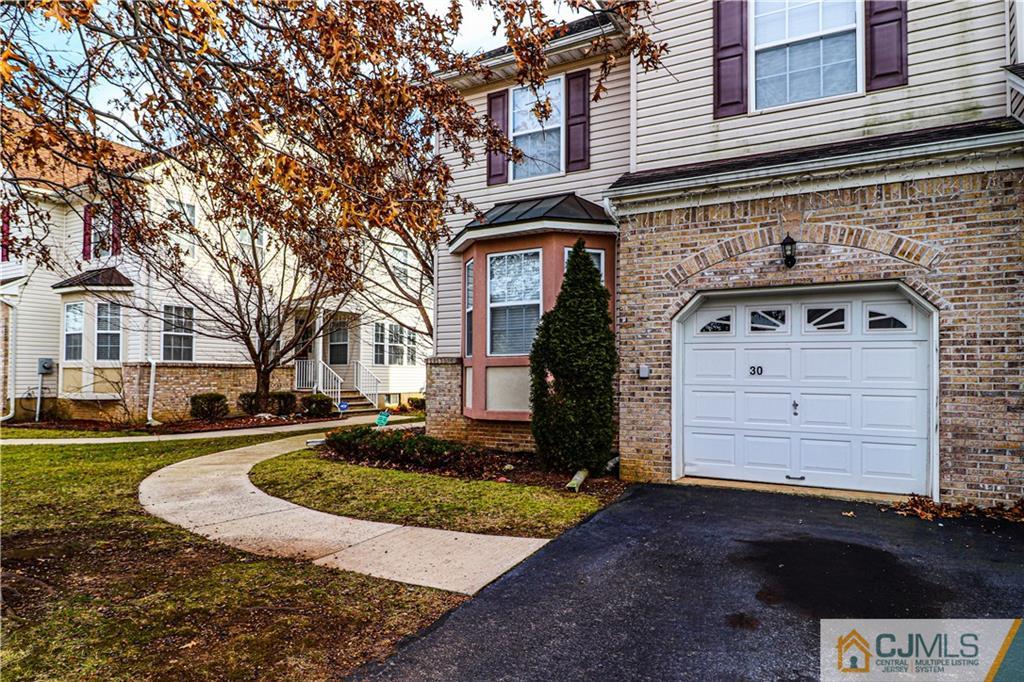 30 Hawthorne Road North Brunswick, NJ 08902 - Photo 1 of 40 a front view of a house with a yard